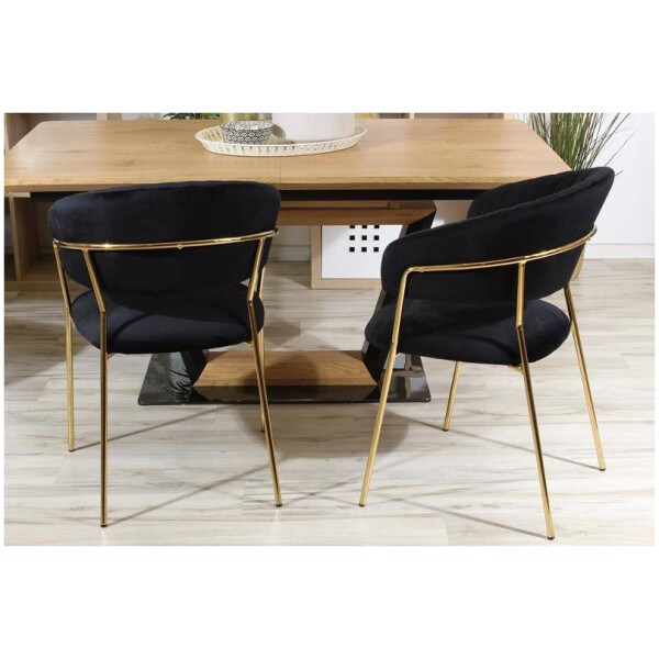 silla de tela terciopelo negro patas de metal en color dorado